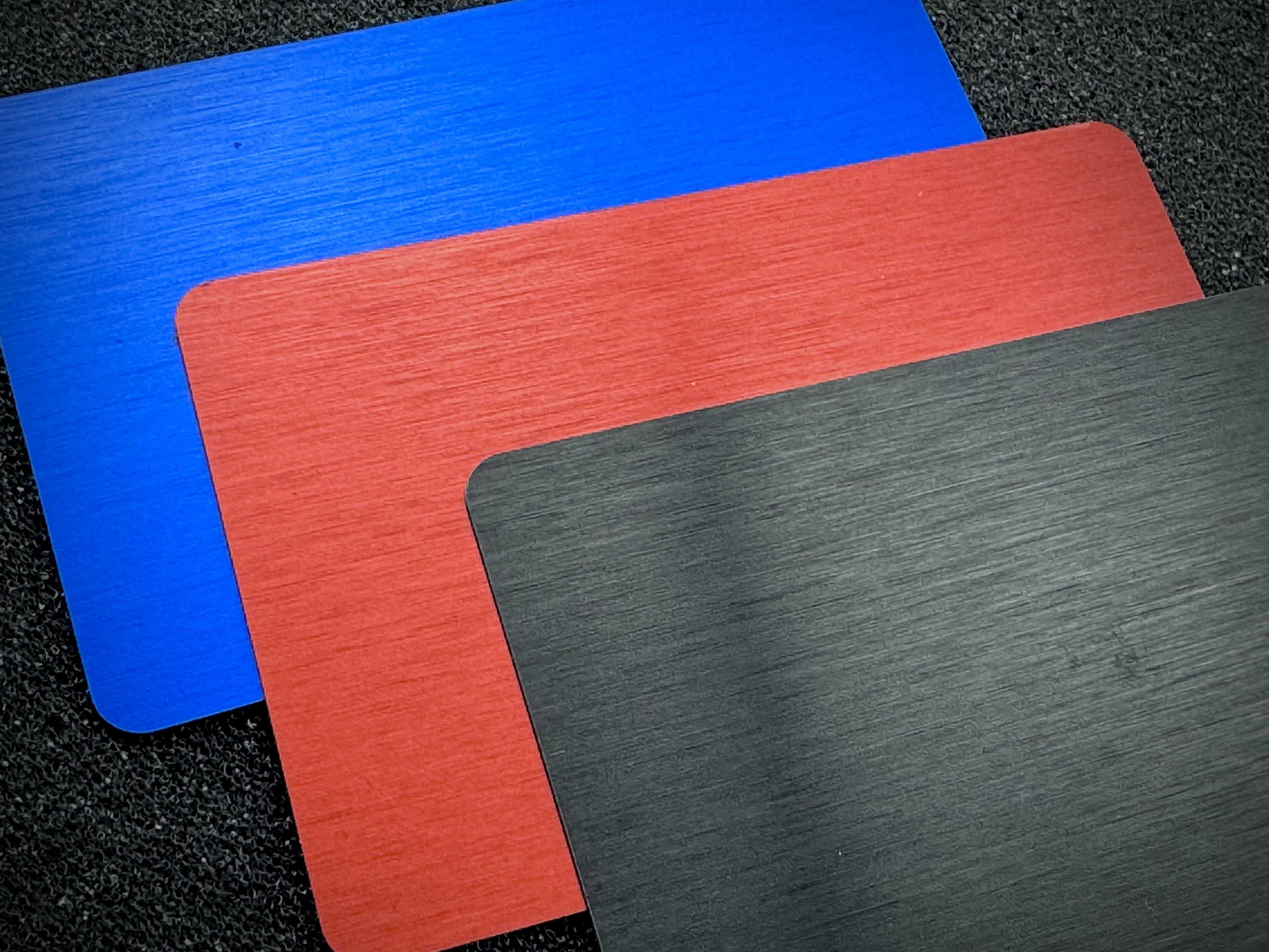 Brushed aluminum material for custom business cards.